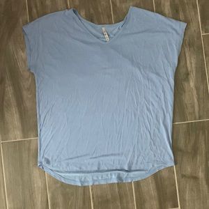 Light blue Leo and Nicole shirt
